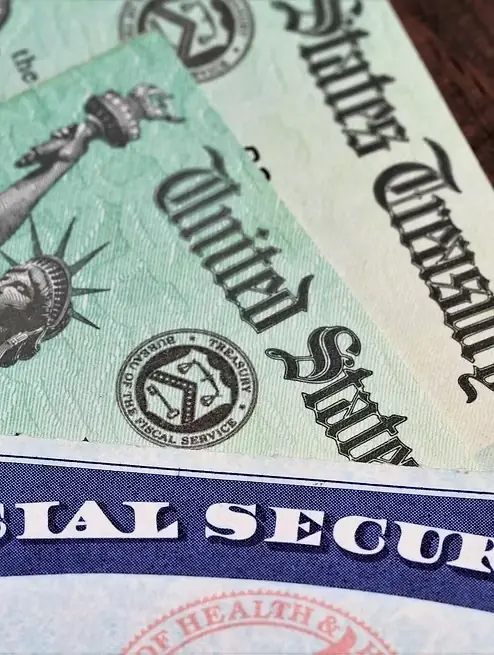Social Security card with United States Treasury benefit checks
